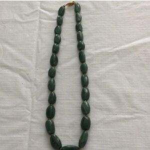 Woman’s Jade Gemstone Necklace can dress up any outfit color green